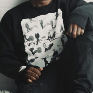 Head in the Clouds merch featured image with black long sleeve design by The Head Space Studios.